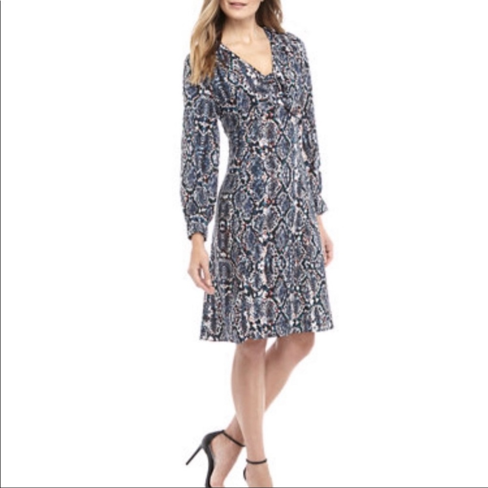 LIKE NEW Cheztu midi dress with a fit and flare feel.